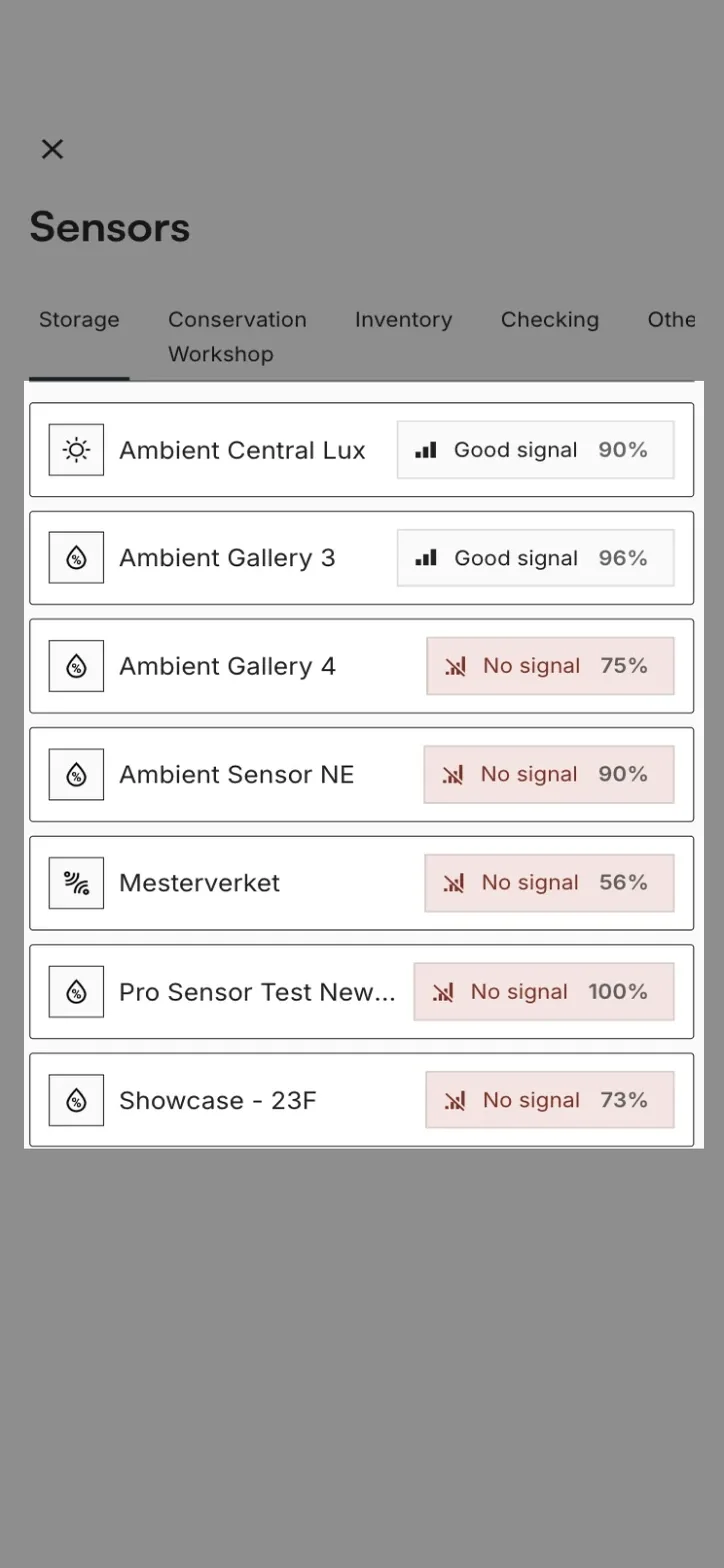 The Sensors screen listing each sensor in a building with its signal badge and percentage
